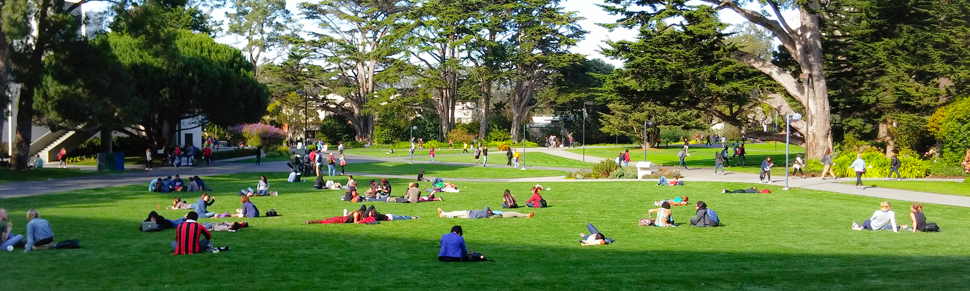 San Francisco State University students sitting in campus quad in Fall