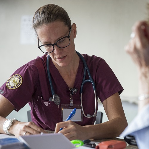 A nursing student taking notes