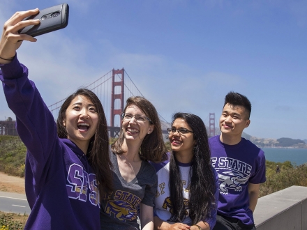 Students taking sefies at Golden Gate bridge